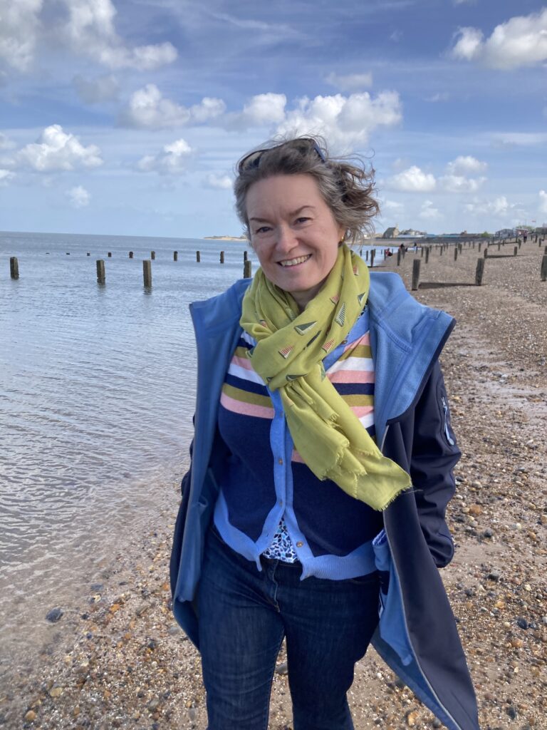 Jana walking by the sea